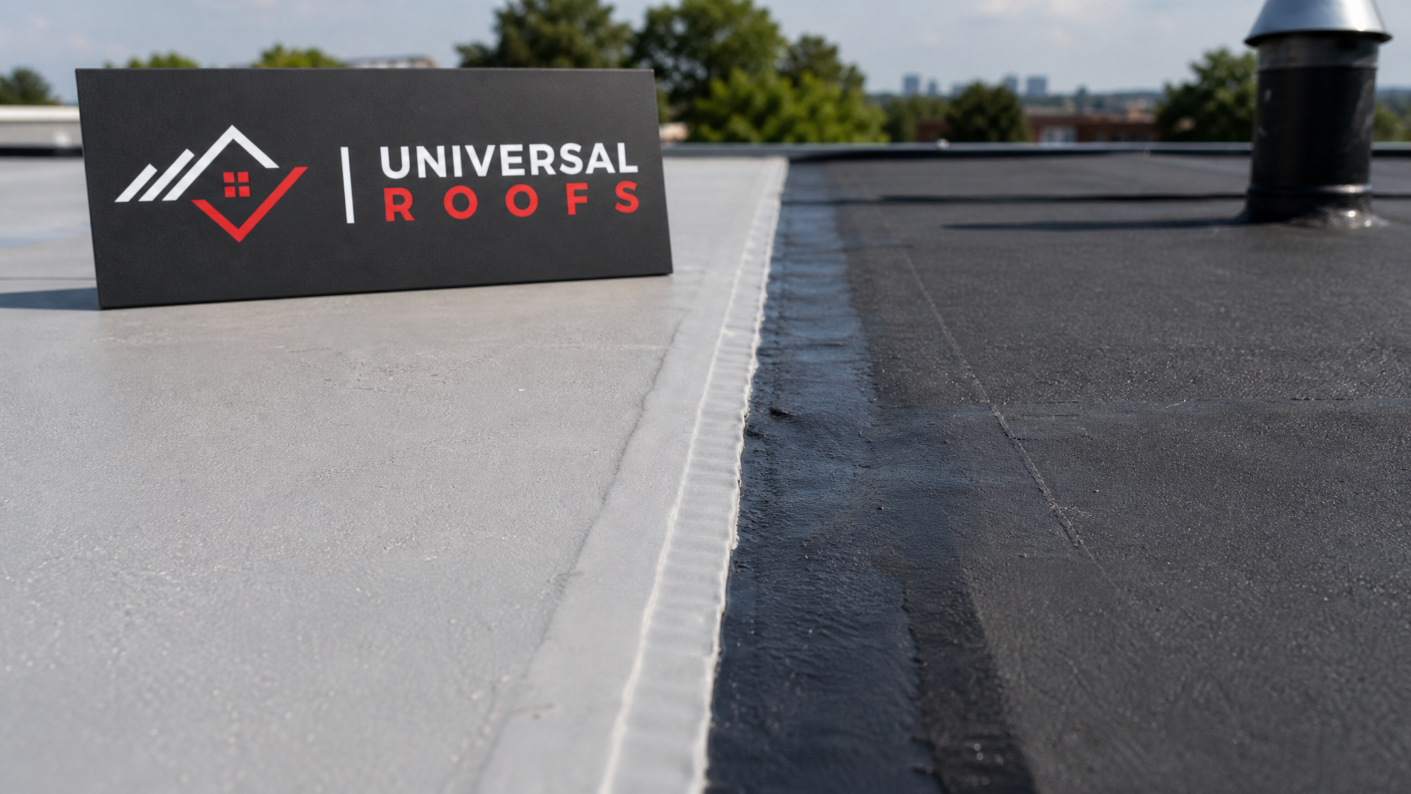 Close-up of a welded PVC membrane seam next to an EPDM rubber patch on a flat roof